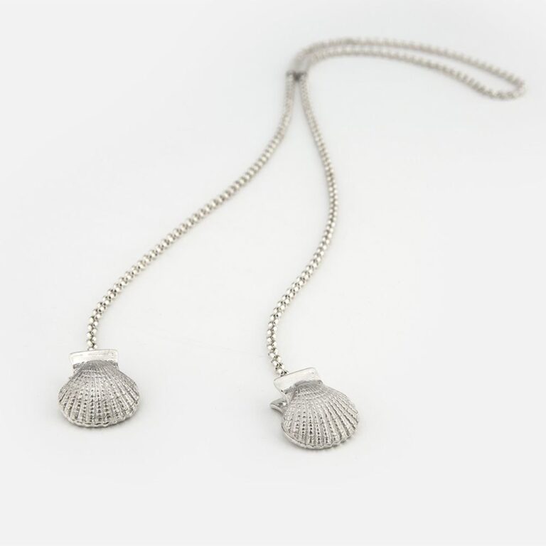 Corrente com molas com conchas para guardanapo em prata da leitão & Irmão