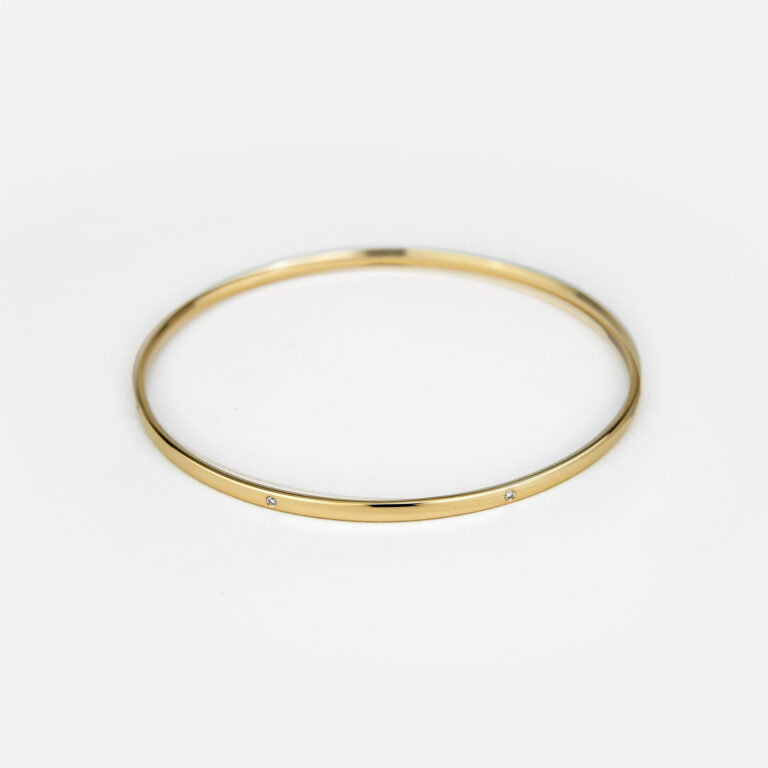 Pulseira escrava em ouro amarelo com 7 diamantes da Leitão & Irmão